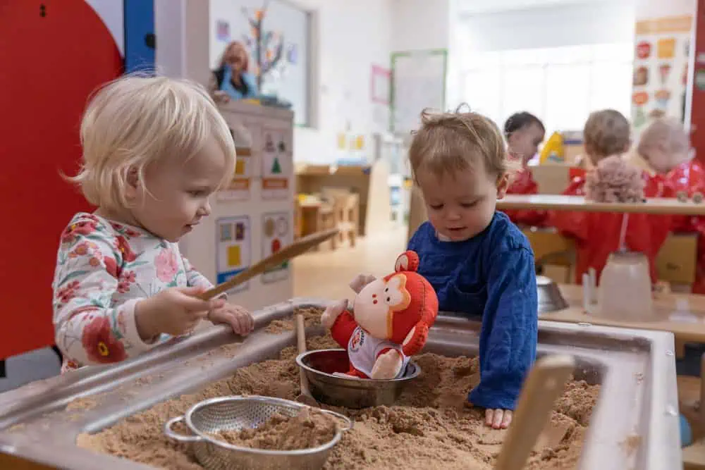 Children playing with marvin toy